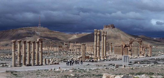 A picture taken on March 14, 2014 shows the citadel (background) of the ancient oasis city of Palmyra, 215 kilometres northeast of Damascus, over looking the city. From the 1st to the 2nd century, the art and architecture of Palmyra, standing at the crossroads of several civilizations, married Graeco-Roman techniques with local traditions and Persian influences. AFP PHOTO/JOSEPH EID (Photo credit should read JOSEPH EID/AFP/Getty Images)